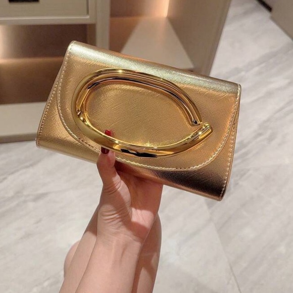 Sophisticated Clutch Gold Accent